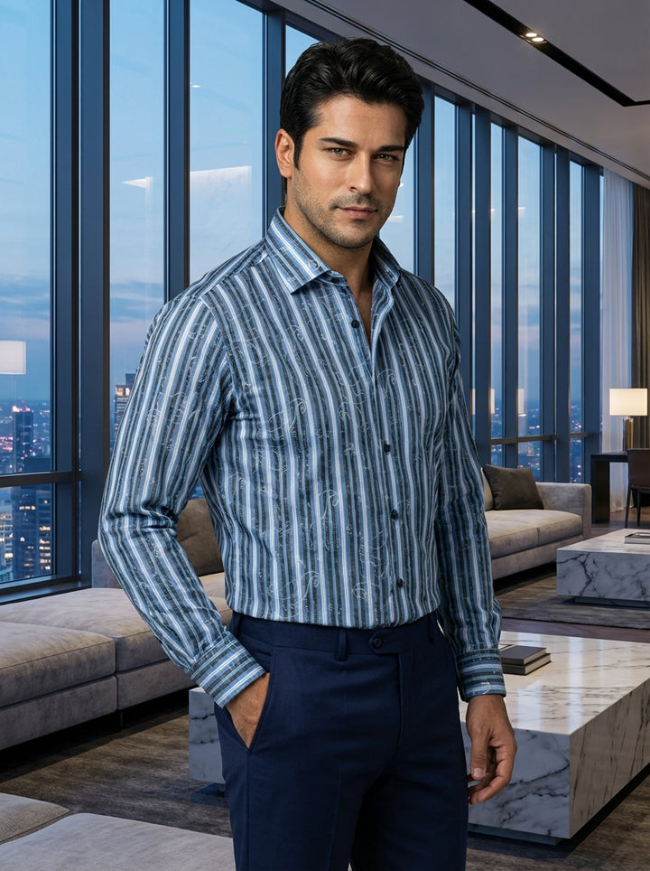 This premium Masutto men's dress shirt features a sophisticated fusion of vertical stripes and a delicate tonal paisley jacquard overlay. Rendered in classic shades of navy, slate, and cerulean blue, it offers a refined, textured aesthetic for modern busi