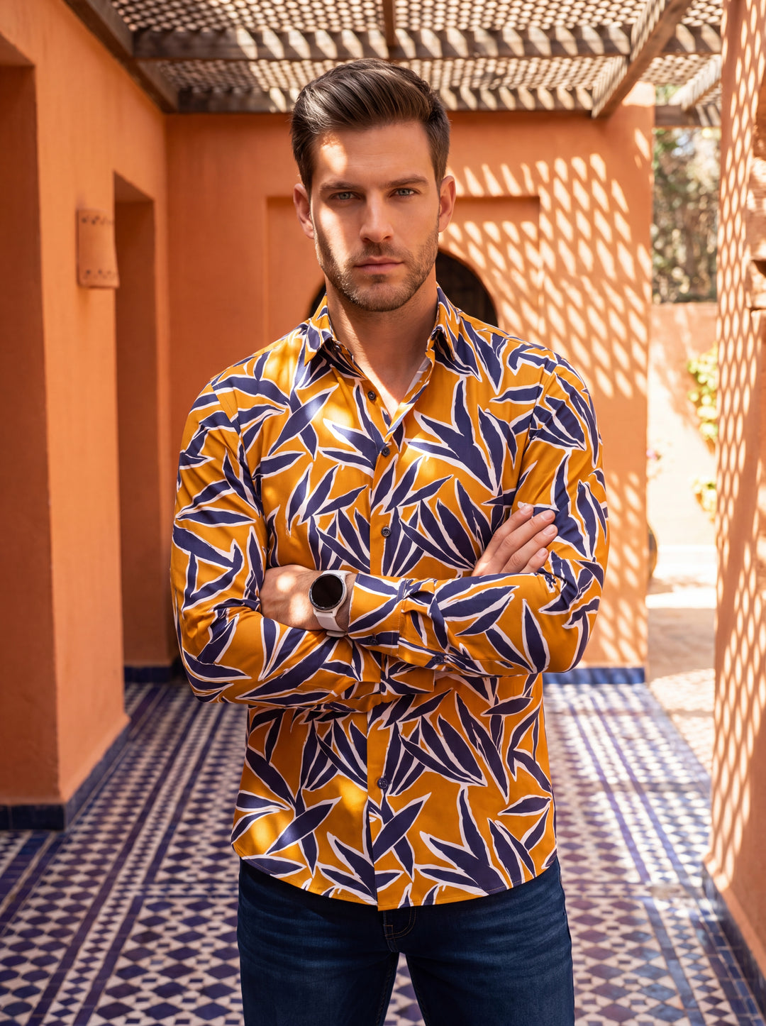 This striking long-sleeve button-down shirt features a vibrant mustard yellow base accented by a bold navy and white abstract botanical print. Crafted for a tailored fit, it offers a contemporary silhouette perfect for making a stylish, confident fashion 
