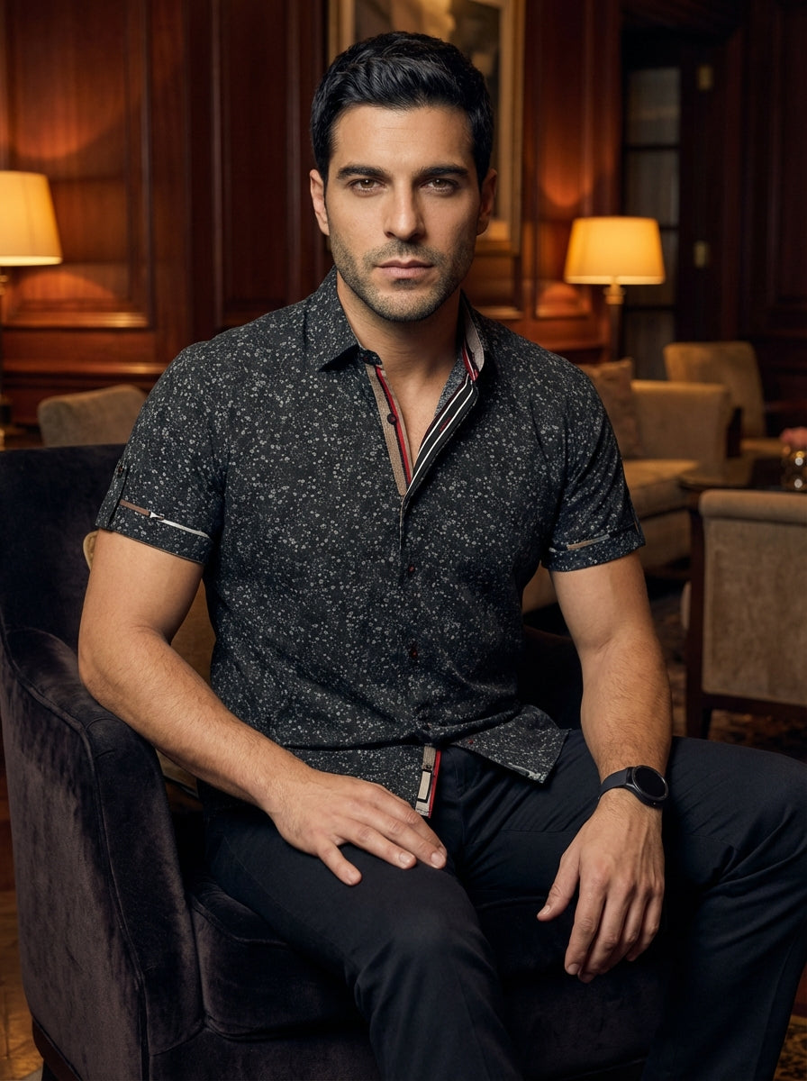 This tailored short-sleeve shirt features a dark grey micro-floral print and intricate contrasting collar details. Crafted for a modern fit, it includes red and white piping inside the placket and cuffed sleeves, offering a sophisticated edge for evening 