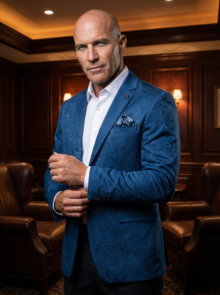 Elevate your formal wardrobe with this premium blue blazer featuring an intricate paisley jacquard pattern. This slim-fit jacket includes notched lapels, a coordinating pocket square, and structured shoulders, paired perfectly with a crisp white dress shi
