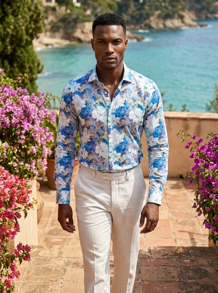 This Masutto button-down shirt features a vibrant, impressionistic floral print in shades of azure, cerulean, and crisp white. Crafted with a tailored fit and sophisticated spread collar, it blends artistic flair with high-end Italian design for a bold su