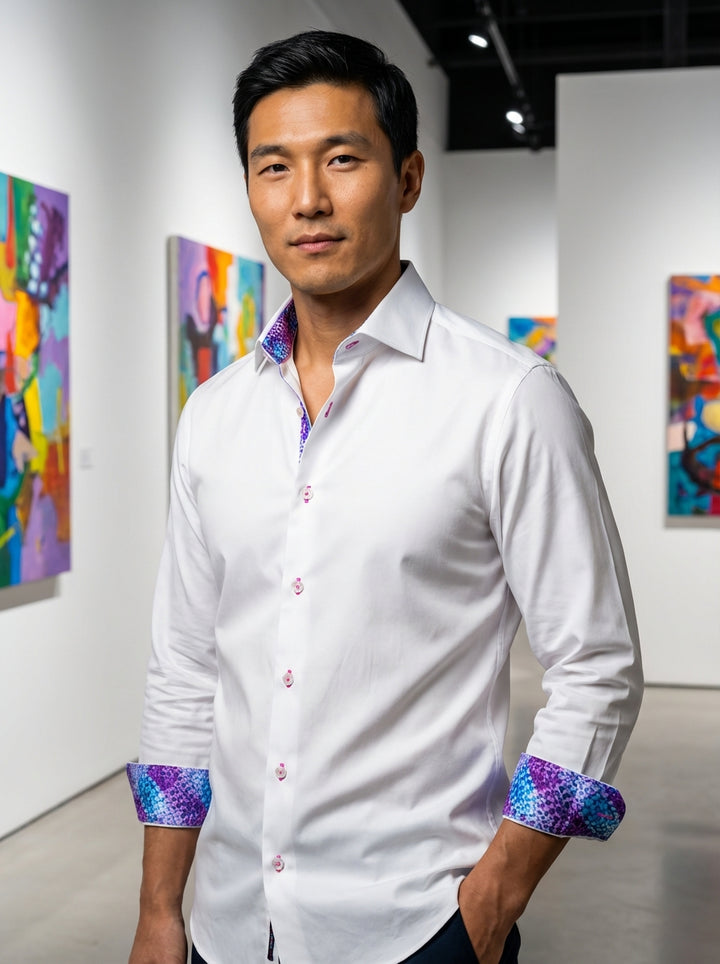 This premium white Masutto dress shirt features a crisp spread collar and vibrant geometric-patterned lining in purple and blue. It is accented with distinctive pink contrast stitching on the buttons and buttonholes, offering a modern, sophisticated twist