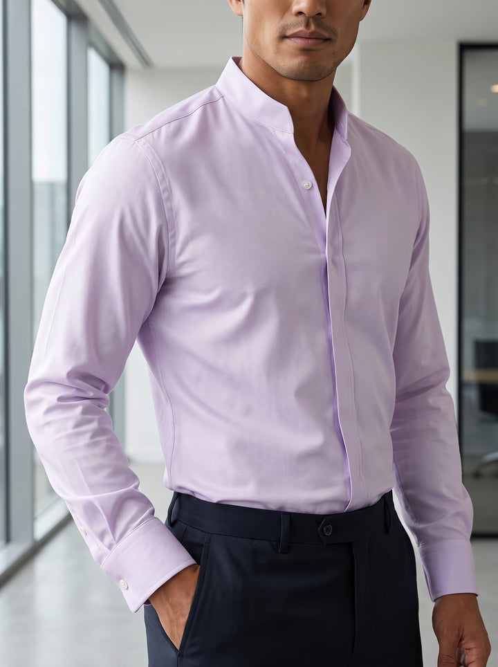 A light lavender long-sleeve dress shirt featuring a unique mandarin-style split collar and hidden placket. Made from textured twill fabric, it includes adjustable button cuffs for a clean, modern aesthetic.