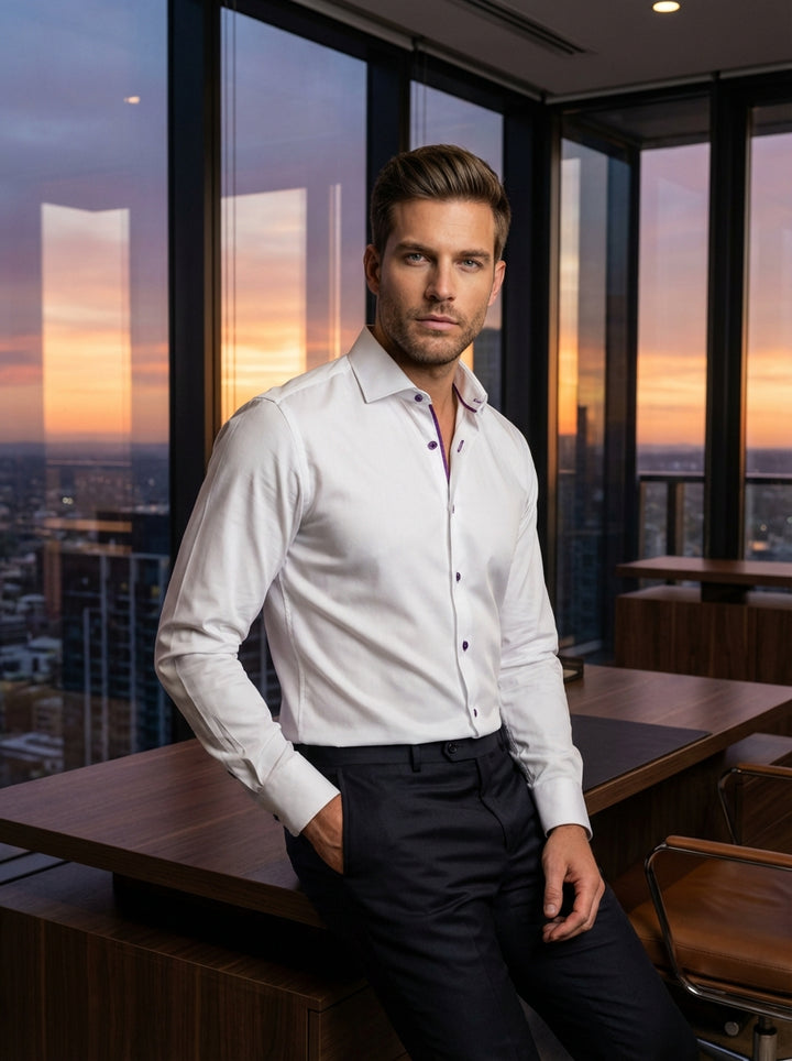 This premium Masutto dress shirt in crisp white features sophisticated purple contrast detailing. The elegant design includes purple buttons with matching thread and a subtle inner collar lining, offering a modern, tailored fit perfect for formal occasion