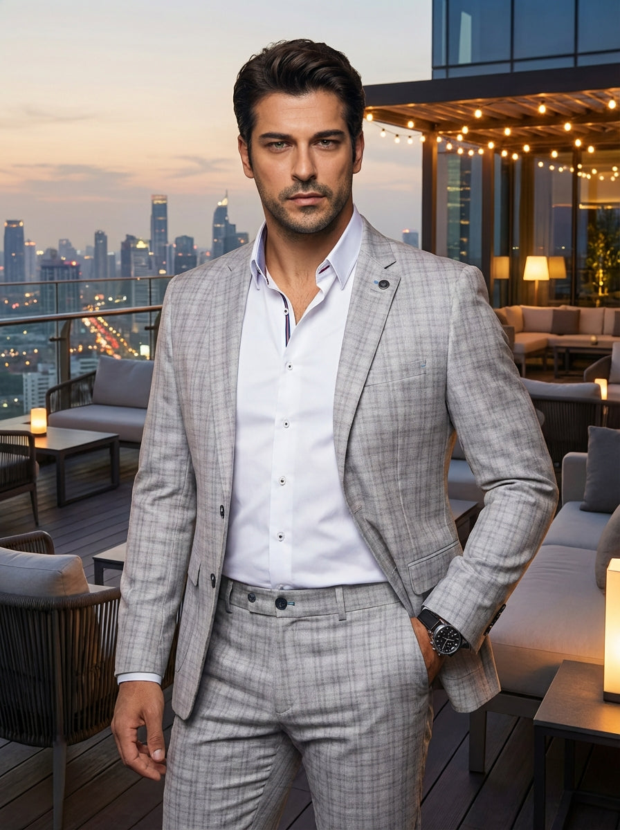 This sophisticated light grey plaid suit features a modern slim-fit silhouette, crafted with premium patterned fabric. The ensemble includes a notched lapel blazer and matching trousers, paired with a crisp white dress shirt featuring distinctive inner co