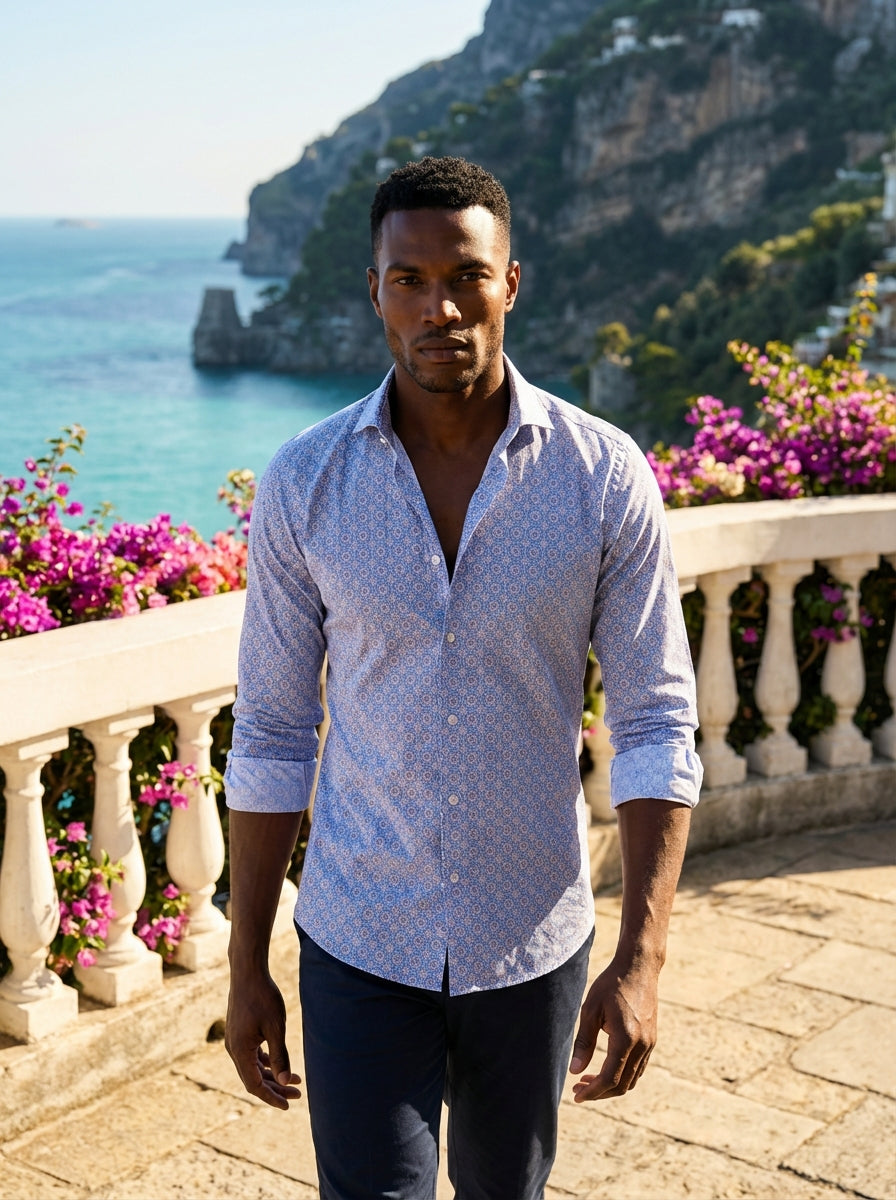 This premium Masutto button-down shirt features an intricate, Mediterranean-inspired geometric tile print in shades of blue and lavender. Crafted with a sophisticated spread collar and adjustable mitered cuffs, it offers a refined slim fit perfect for mod