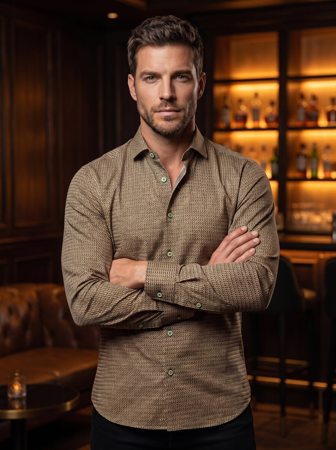 This sophisticated long-sleeve button-down shirt features an intricate, geometric micro-pattern in earthy tones. Crafted with a tailored fit, it includes a classic spread collar and contrasting buttons, offering a versatile aesthetic that bridges the gap 