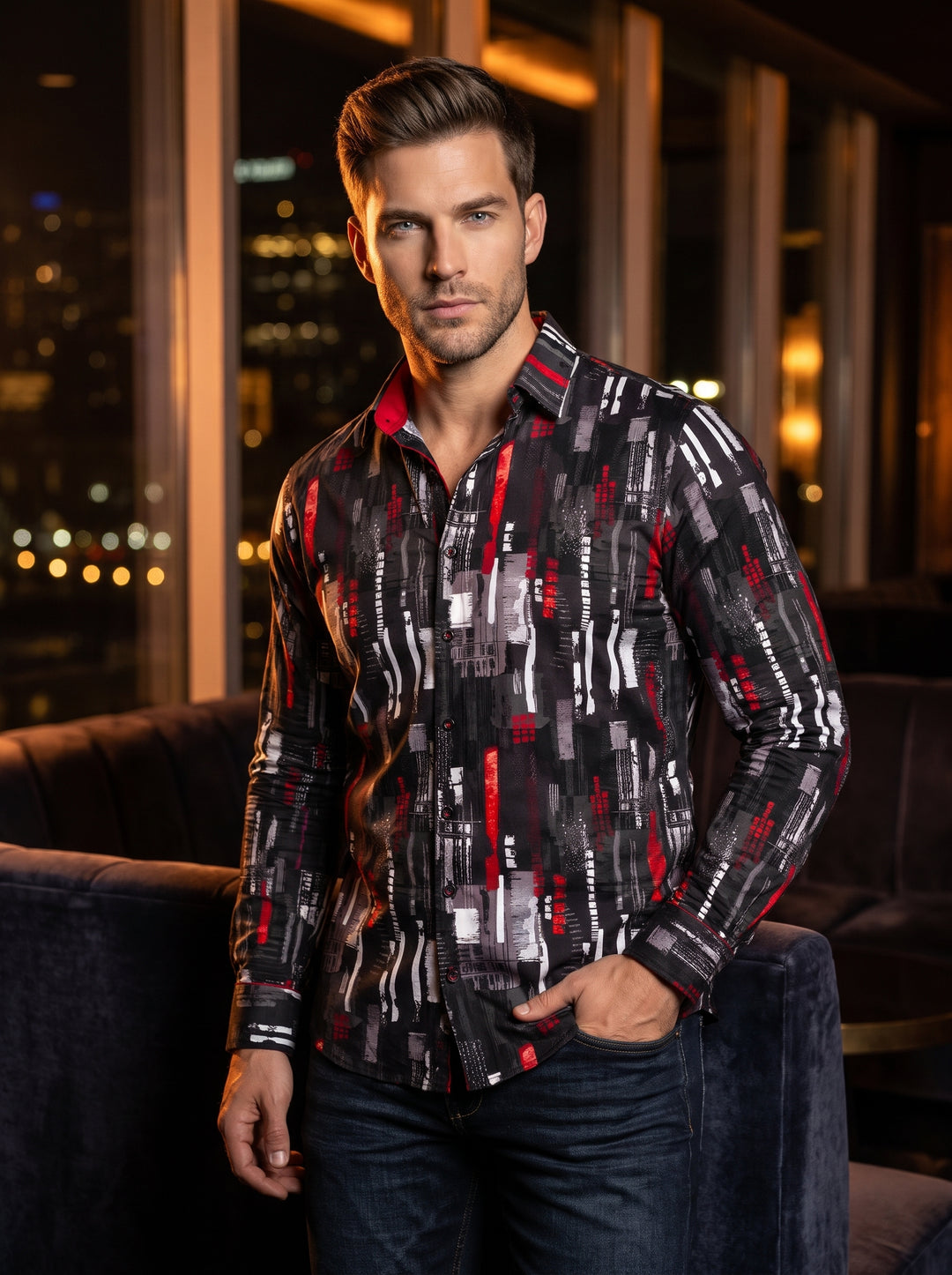 A modern, long-sleeved button-down shirt featuring a bold abstract print. The design combines vertical brushstroke patterns in white and grey with vibrant red accents against a deep black base, complemented by red interior collar lining and a structured t