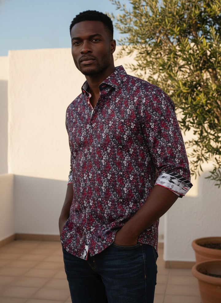 This refined long-sleeve shirt features an intricate floral pattern in rich burgundy, white, and grey tones, accented with subtle red piping and distinctive inner cuff detailing. Perfect for sophisticated casual wear.