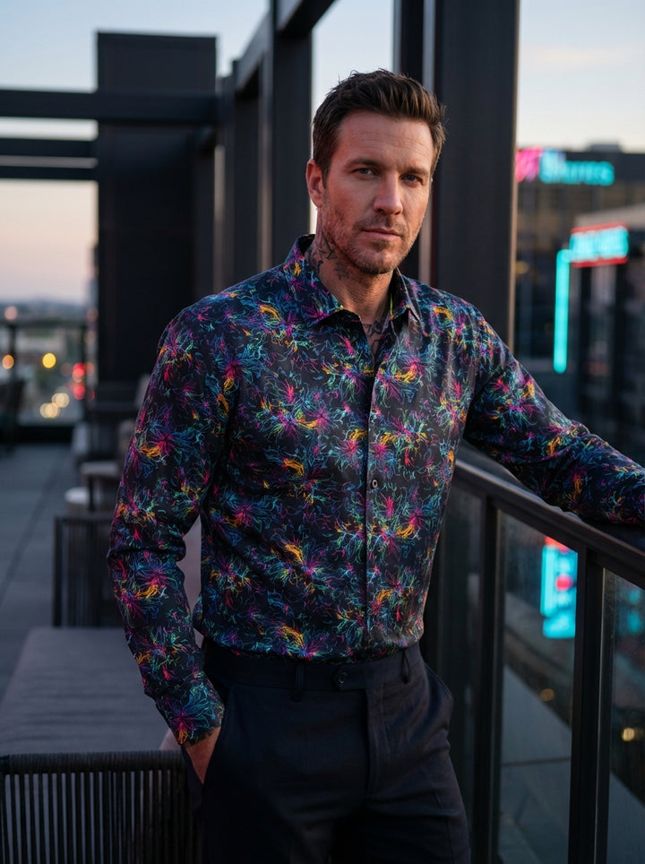 Elevate your evening wardrobe with this Masutto men's button-down shirt. Crafted from premium black fabric, it features an electric, multicolored neon floral sketch print. The intricate linework in pink, yellow, and turquoise creates a dynamic, artistic a