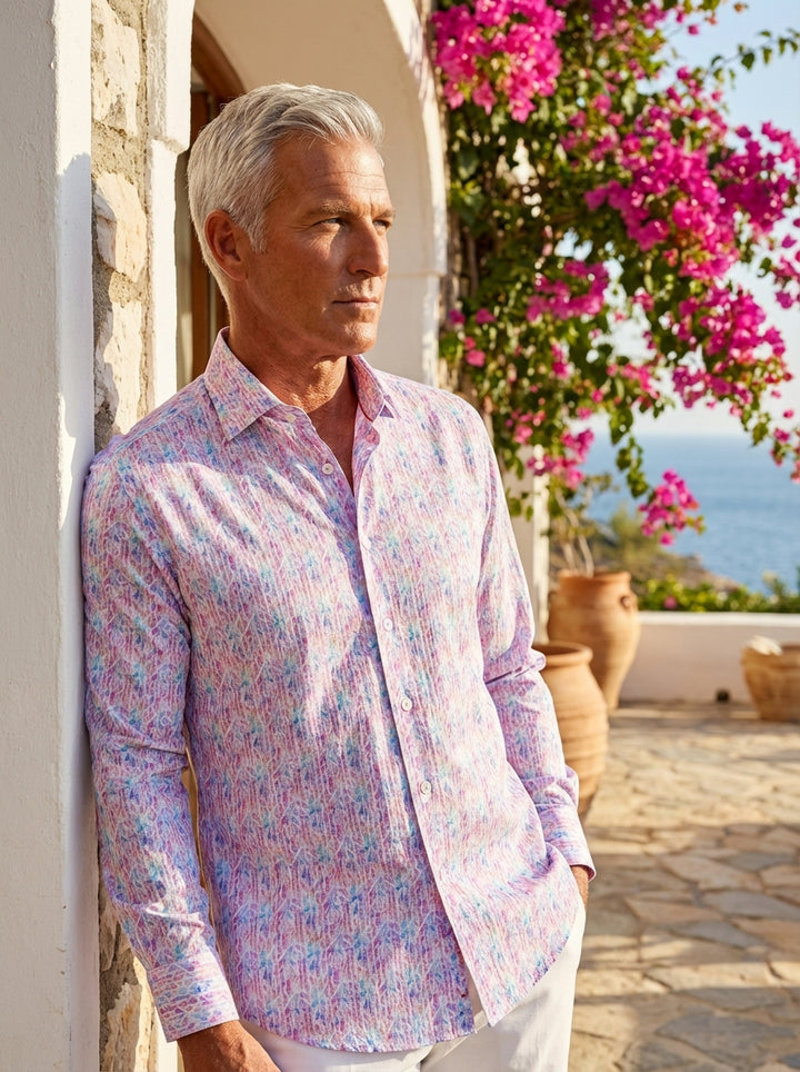 This Masutto long-sleeved button-down shirt features a vibrant, multi-colored geometric mosaic pattern in shades of pink, purple, and blue. Crafted from high-quality fabric, it offers a contemporary fit with a classic spread collar and elegant pearlized b