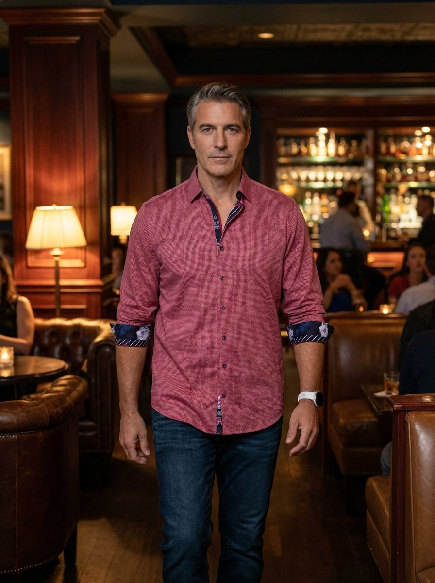 A sophisticated red long-sleeved button-down shirt featuring a micro-patterned texture. The design includes contrasting navy floral trim on the inner collar and cuffs, adding a touch of modern flair. Crafted for a tailored fit, it pairs perfectly with dar