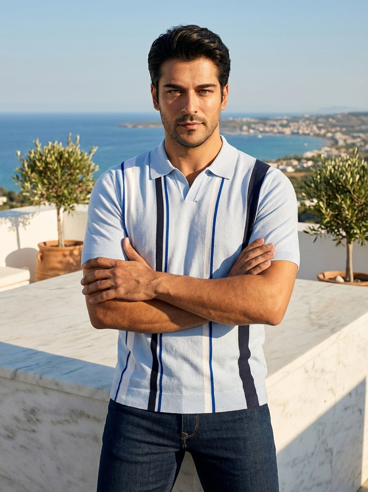 This light blue, short-sleeved knit polo features a refined collar and a modern vertical stripe pattern in navy and white. Crafted from premium, breathable fabric, it offers a tailored fit that seamlessly transitions from professional office wear to casua