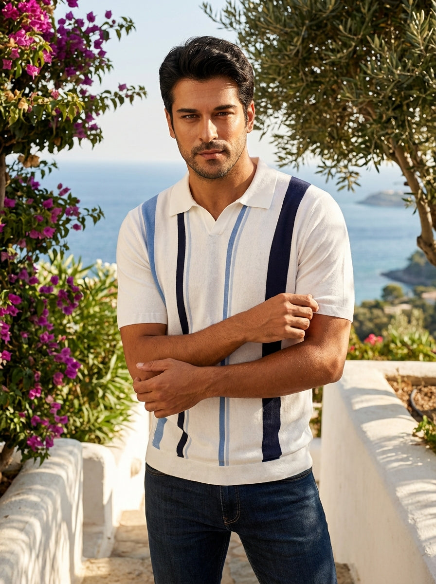 This sophisticated men's short-sleeve knit polo features a crisp white base accented by bold vertical stripes in navy and sky blue. Crafted with a classic open collar and a refined tailored fit, it offers a modern take on retro-inspired leisurewear.