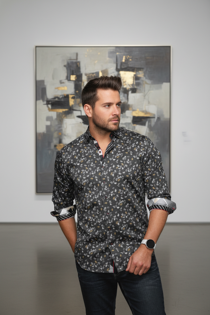 Exude modern sophistication in this charcoal long-sleeve shirt, adorned with an intricate white and gold paisley motif. Featuring a refined button-down collar and distinctive striped cuff details, it's perfect for a distinguished contemporary look.