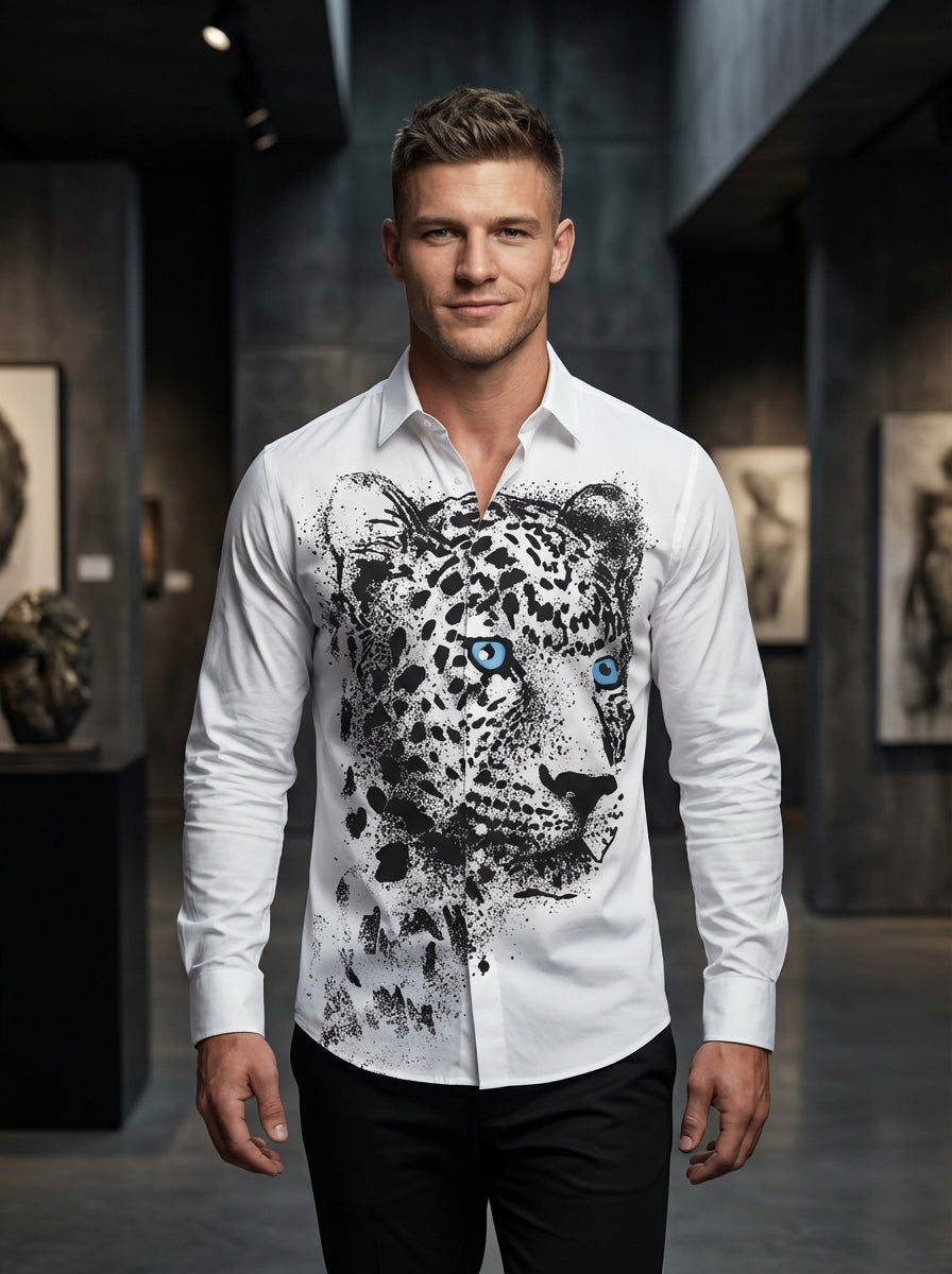 This sophisticated white button-down shirt features a striking black splatter and abstract print across the lower torso. Crafted with a crisp spread collar and contrasting black buttons, it combines classic tailoring with a modern, artistic edge for a bol