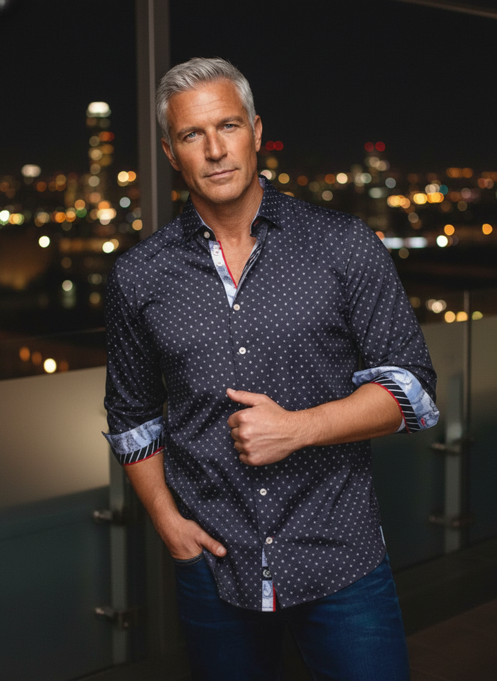 Elevate your look with this sophisticated dark blue polka dot button-down shirt. Featuring a tailored fit and unique contrast lining on the collar, placket, and rolled cuffs, it exudes modern elegance and distinctive style for the discerning gentleman.
