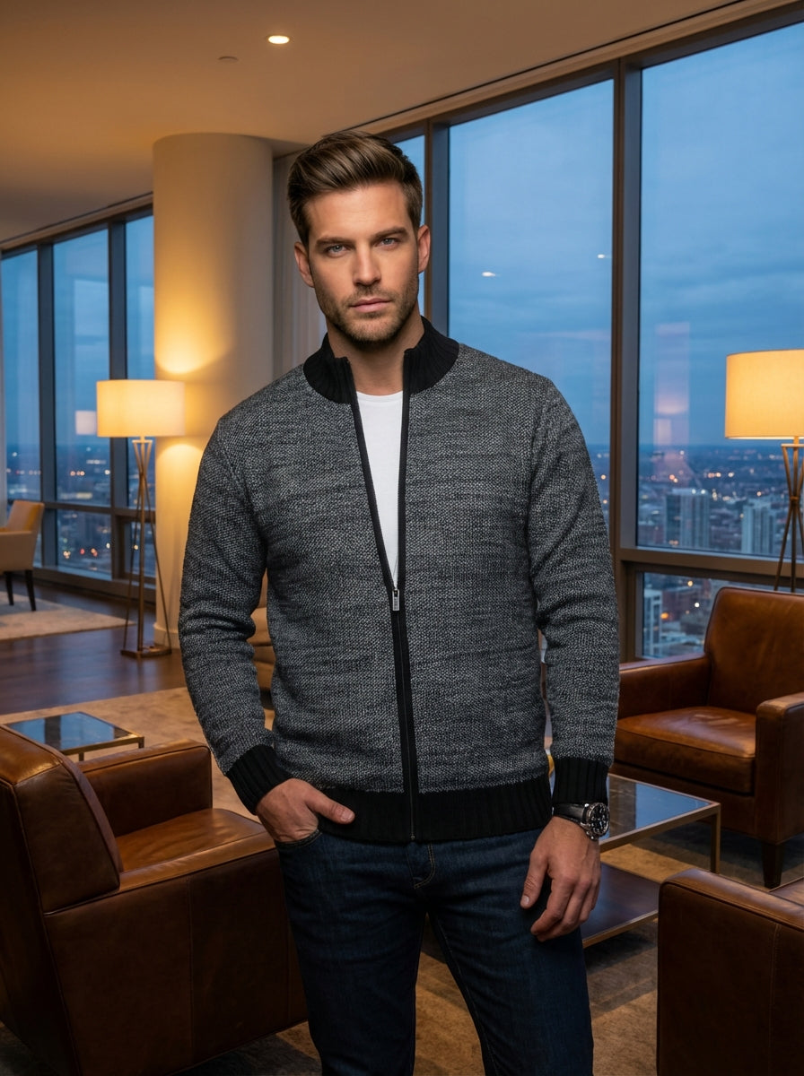 This men's zip-up cardigan features a sophisticated grey textured knit with contrasting black ribbed trim on the collar, cuffs, and hem. Designed for a tailored fit, it offers a modern look that seamlessly bridges the gap between casual and formal.