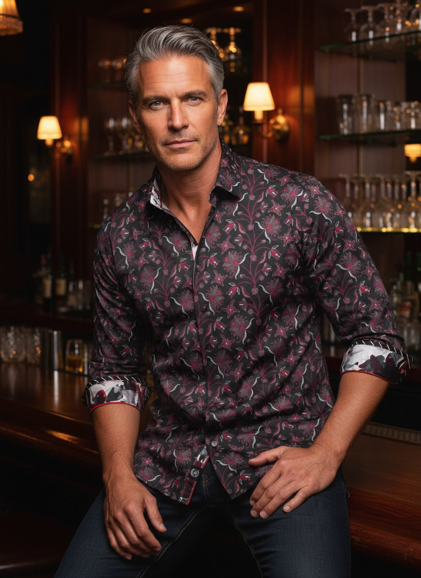 Exquisitely tailored button-down shirt featuring a sophisticated burgundy floral motif on a charcoal base. Accented with contrast-print inner cuffs and subtle red piping, this piece offers a refined blend of modern elegance and bold personality.