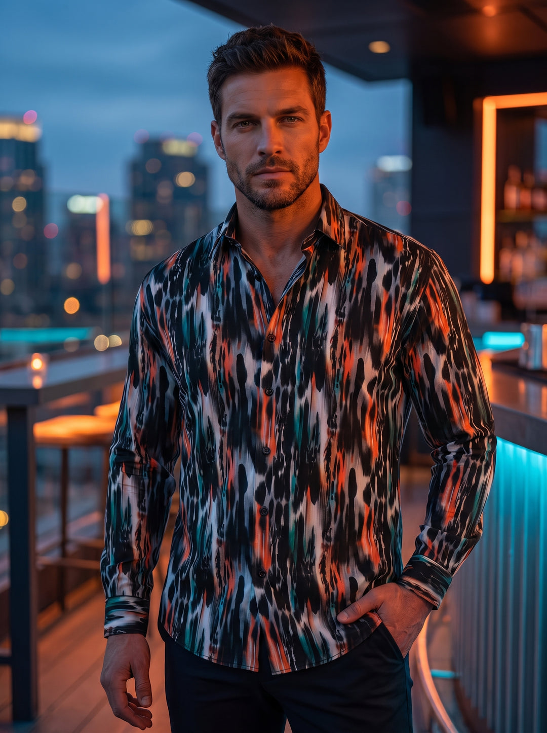 This mens long-sleeved button-up shirt features a striking abstract ikat-inspired print. Vertical strokes of black, grey, and vibrant orange with hints of teal create a dynamic, painterly effect. Crafted with a tailored fit, it offers a contemporary and a