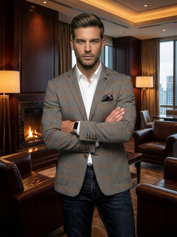 This sophisticated grey plaid blazer features subtle orange and yellow windowpane checks. Tailored for a modern fit, it includes a notch lapel, single-breasted closure, and a coordinating pocket square. The textured fabric offers a versatile look for both