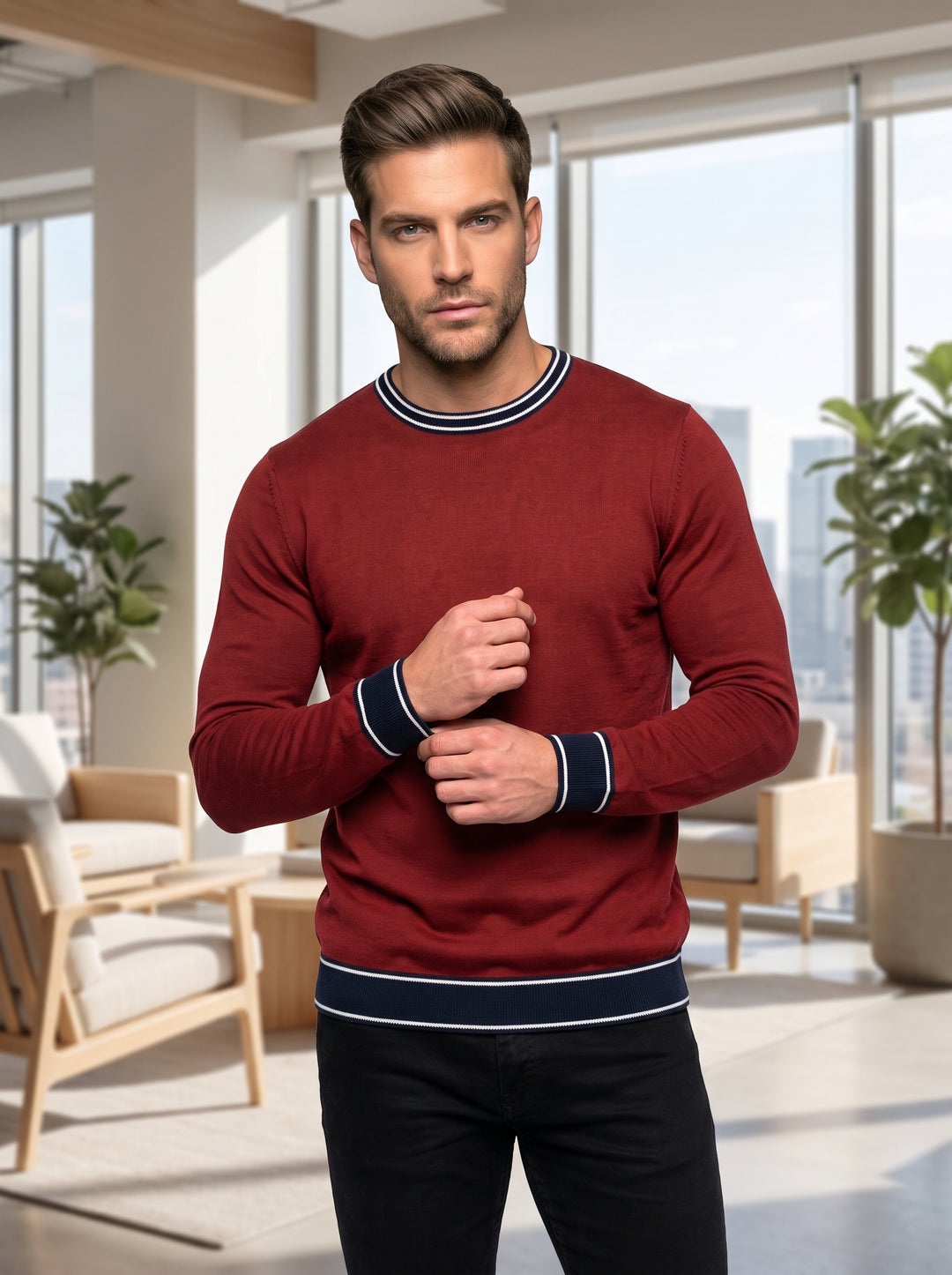 This classic crewneck sweater is crafted in a rich burgundy knit with a slim fit. It features sophisticated navy blue and white striped tipping on the neckline, cuffs, and hem, adding a sporty yet refined collegiate touch to the garment.