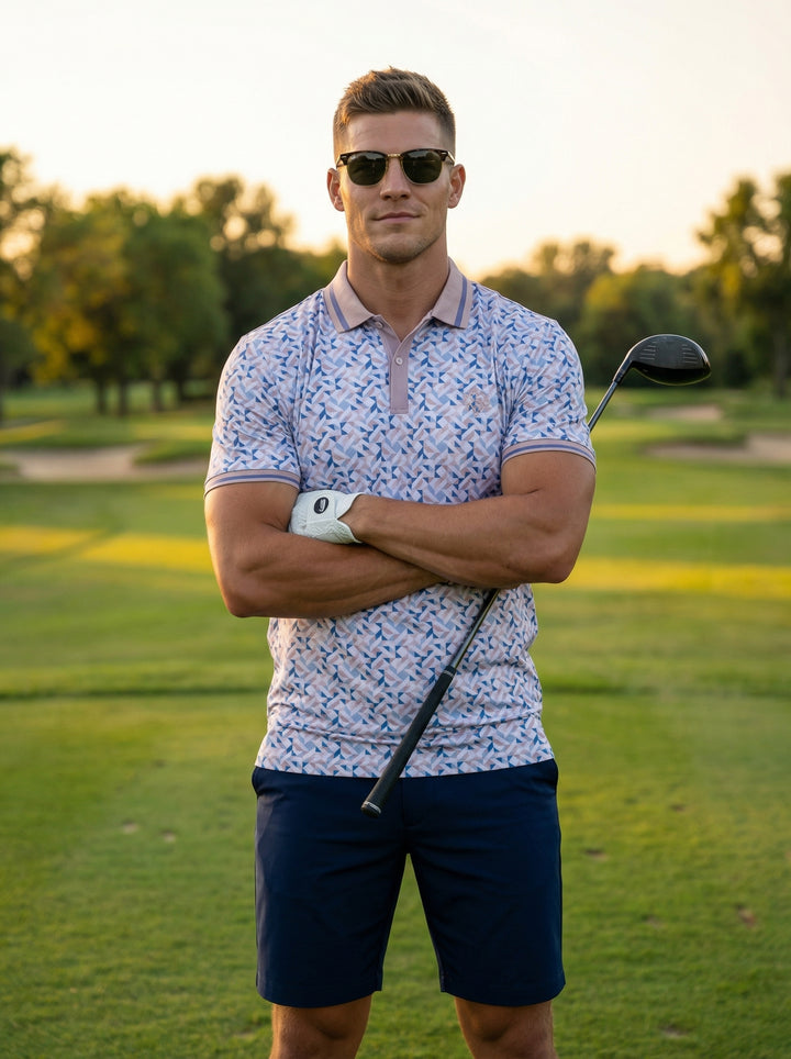 This men's short-sleeved polo features an intricate geometric tessellation pattern in shades of blue, lavender, and tan. Detailed with a contrasting mauve ribbed collar and sleeve cuffs, this modern slim-fit shirt offers a sophisticated aesthetic for warm