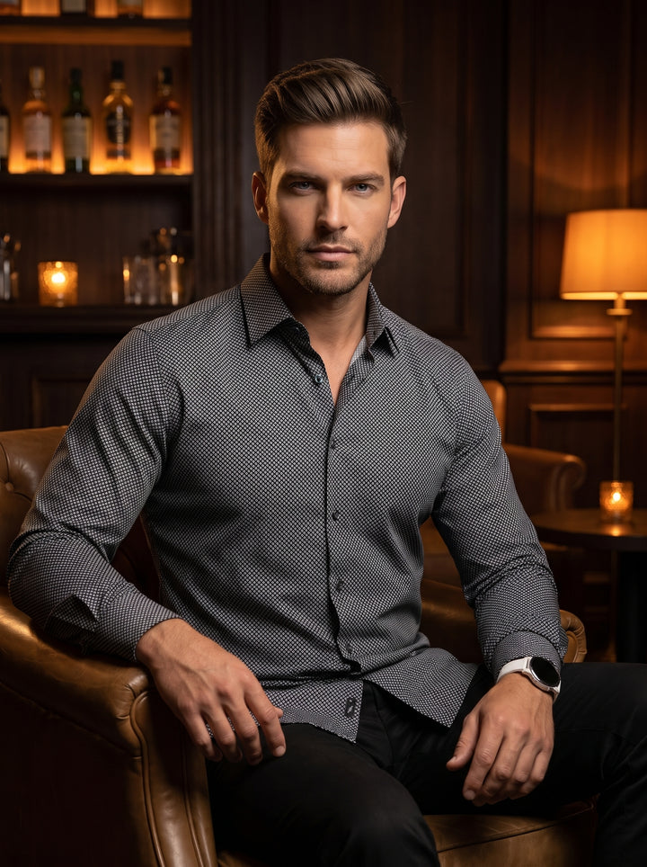 This sophisticated long-sleeve button-down shirt features a micro-geometric diamond pattern in black and white. Crafted for a tailored fit, it includes a classic pointed collar and adjustable cuffs, making it a versatile piece for transitions from day to 