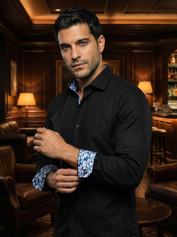Elevate your evening attire with this Masutto black button-down shirt. Featuring a sophisticated tonal jacquard geometric pattern, it reveals a playful touch with a blue floral contrast lining on the inner collar and cuffs for a modern, refined look.