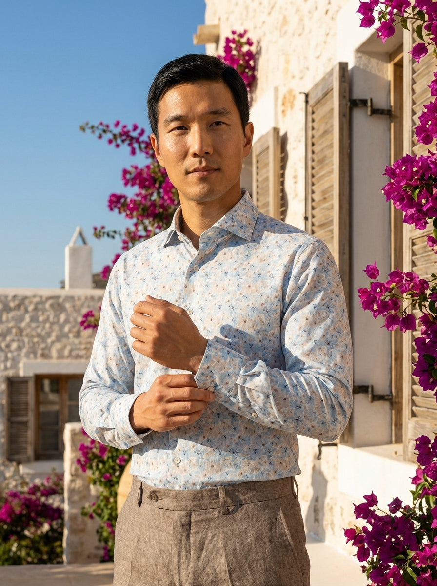 Elevate your casual wardrobe with this Masutto men's button-down shirt. Featuring a delicate floral print in light blue and cream tones, this breathable cotton-blend piece offers a refined yet relaxed aesthetic, complete with a classic collar and adjustab