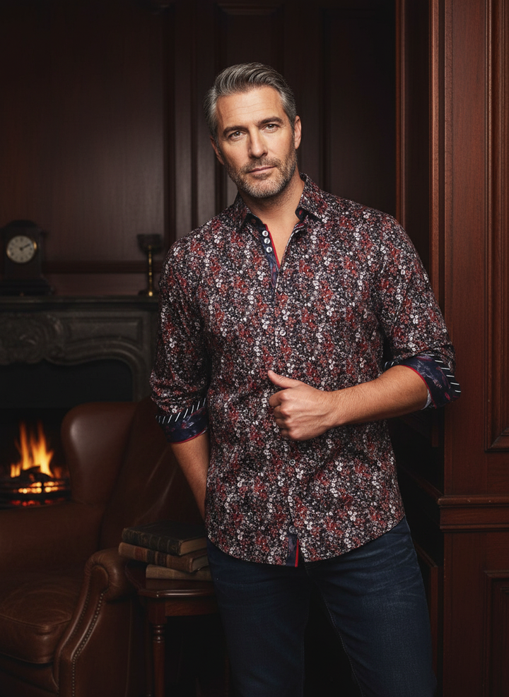 Elevate your style with this sophisticated men's long-sleeve shirt. A rich floral print in deep reds and whites adorns a dark ground, accented by refined contrast detailing on the collar and cuffs for a modern, high-end look.