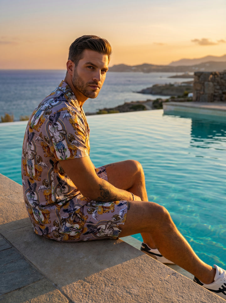 These luxurious men's swim shorts feature an intricate Greco-Roman inspired print with statues, lions, and eagles set against ornate gold filigree frames. Crafted with an elastic waistband and adjustable drawstrings, they offer a bold, artistic aesthetic 