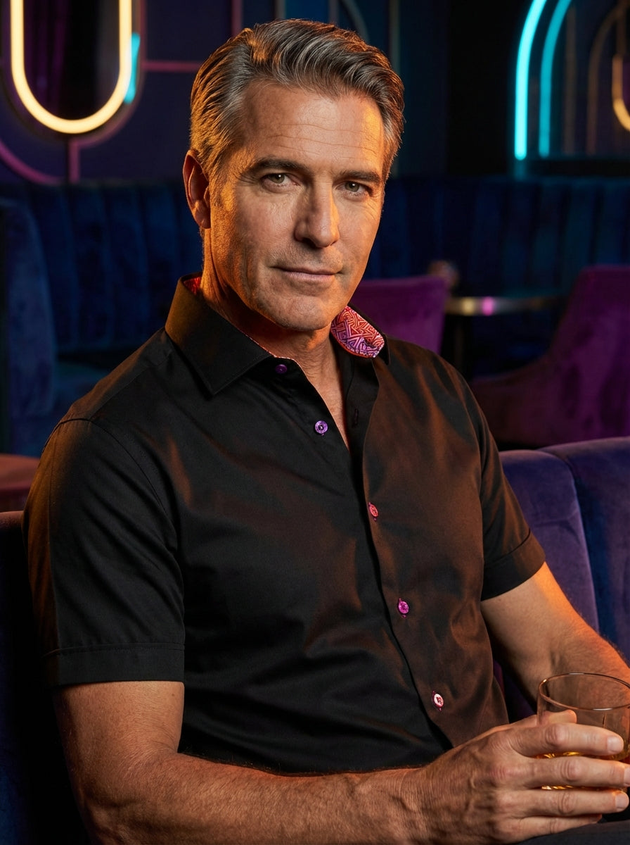 This Masutto black short-sleeve button-down features vibrant purple buttons and a striking geometric pattern on the inner collar. Crafted for a sleek look, the pop of color adds a modern, sophisticated twist to a classic menswear essential for stylish occ