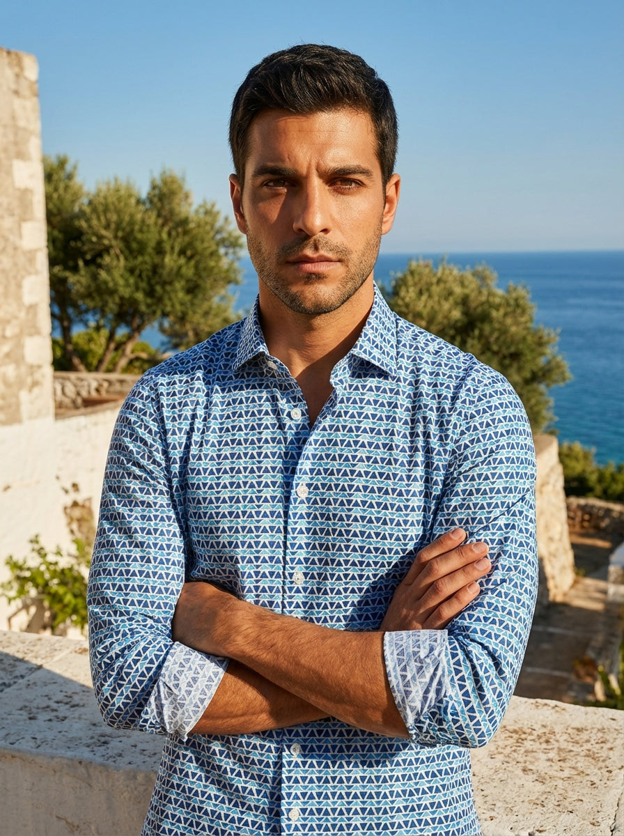 Elevate your casual wardrobe with this Masutto long-sleeve button-down shirt. Featuring a captivating geometric print of watercolor-textured triangles in various shades of blue and white, this piece offers a modern, artistic aesthetic. Crafted for comfort