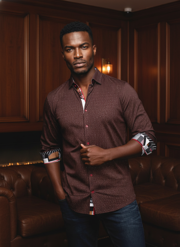 Elevate your style with this sophisticated men's burgundy long-sleeve shirt. Featuring a subtle geometric pattern, vibrant red button stitching, and intricate multi-patterned contrast fabric at the collar and cuffs, it exudes modern elegance for a refined