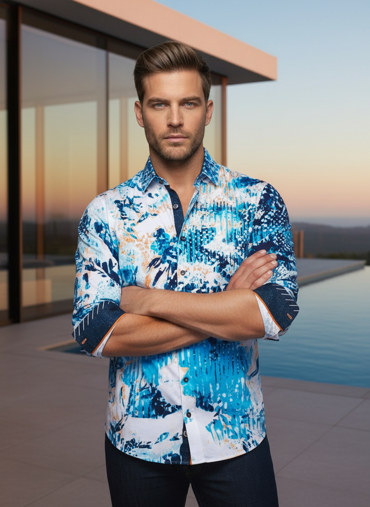 A masterpiece of modern tailoring, this slim-fit shirt features a bold, abstract print in shades of teal and azure. Striking orange contrast accents and intricate cuff detailing provide a sophisticated finish for the contemporary gentleman.