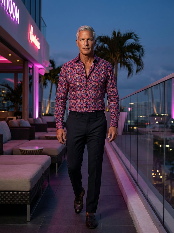 Elevate your evening wardrobe with this Masutto long-sleeve button-down shirt. Featuring a vibrant, all-over tropical leaf print in striking pink, purple, and orange hues against a deep black backdrop, it offers a sophisticated yet bold aesthetic for mode