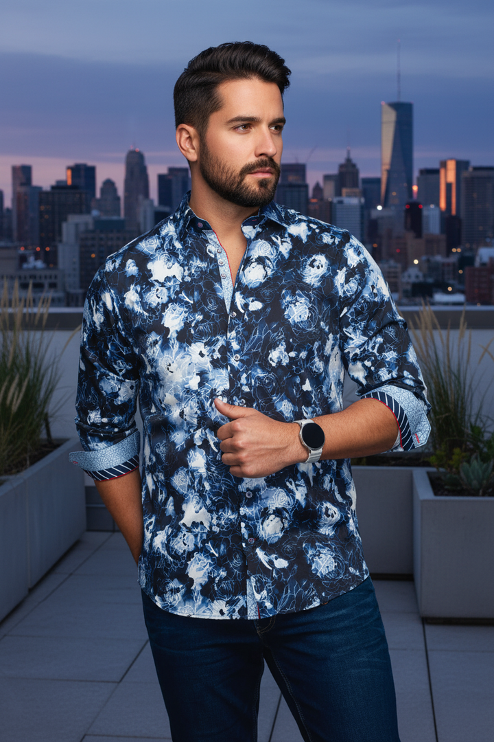 A striking long-sleeve button-up shirt, featuring an intricate blue and white abstract floral print. Crafted for sophisticated style, its distinctive pattern offers an artistic statement perfect for the modern gentleman.