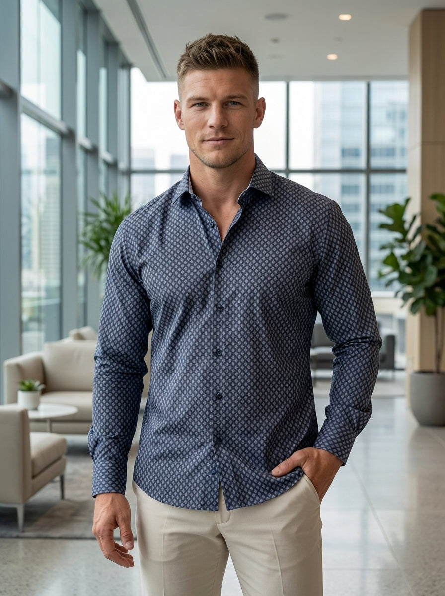 This sophisticated long-sleeve button-down shirt features an intricate geometric diamond print in shades of navy and grey. Crafted with a classic pointed collar and adjustable cuffs, its tailored fit provides a sharp silhouette suitable for elevated casua
