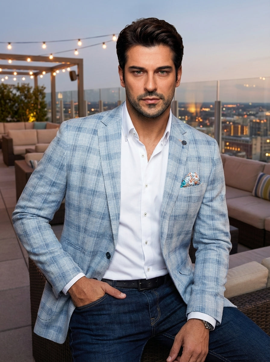 This sophisticated light blue plaid blazer offers a refined contemporary fit with a textured weave. Featuring notched lapels and a vibrant floral pocket square, it pairs perfectly with a crisp white button-down and dark denim for a polished, versatile aes